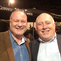 A smiling Danny Morrison and Glenn outside an event.
